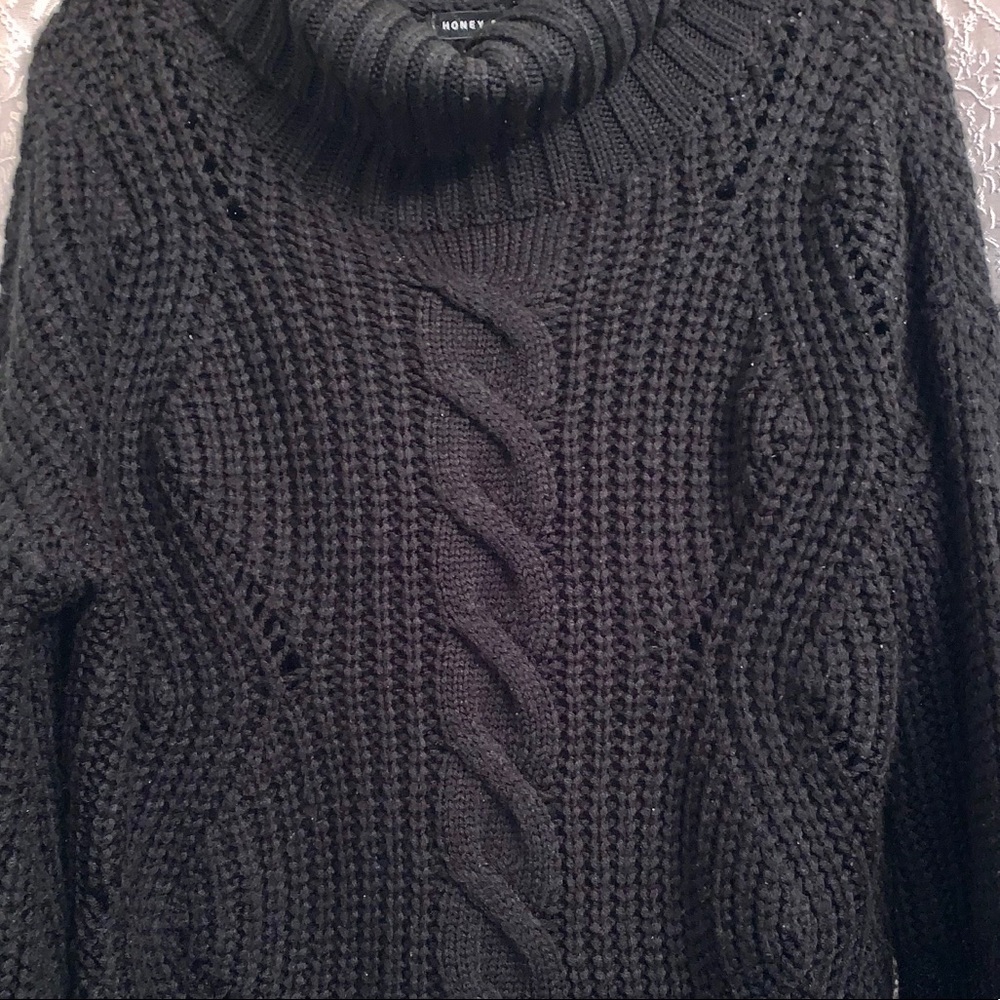 Chucky turtleneck sweater.